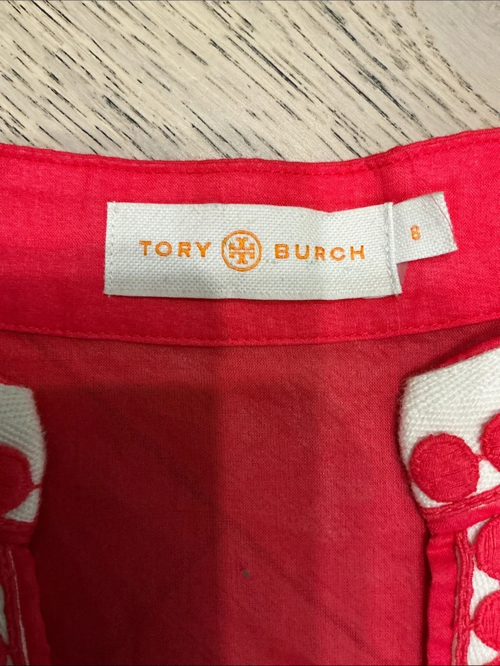 Woman’s Tory Burch red tunic top. Small. V neck. Side zipper. Barely worn! Cute!